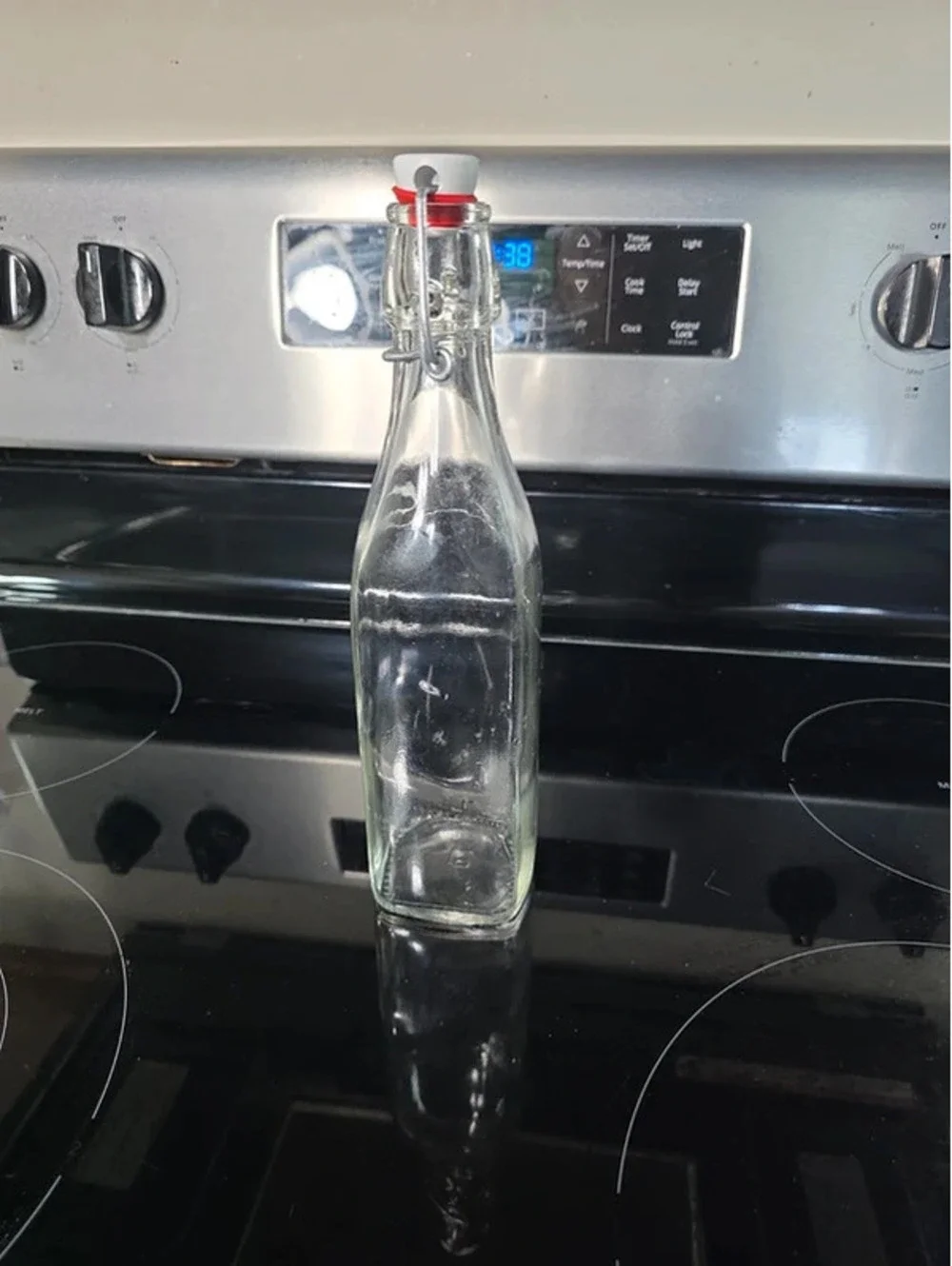 Clear Glass Bottle with Swing-Top Cap